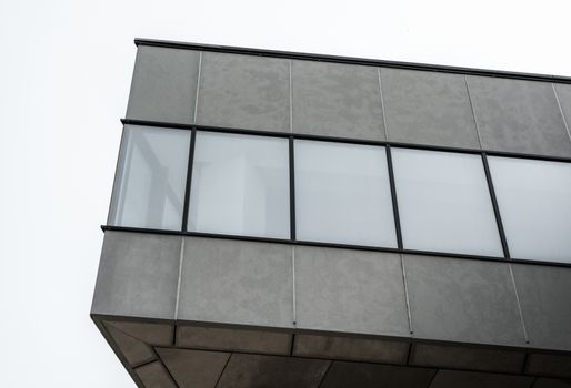 fragment of concrete structure with empty windows