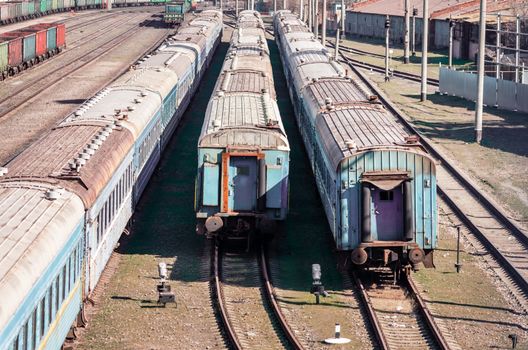 old rusty abandoned trains at a station in Ukraine crisis and corruption stolen reform