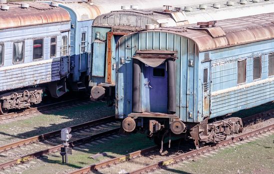 old rusty abandoned trains at a station in Ukraine crisis and corruption stolen reform