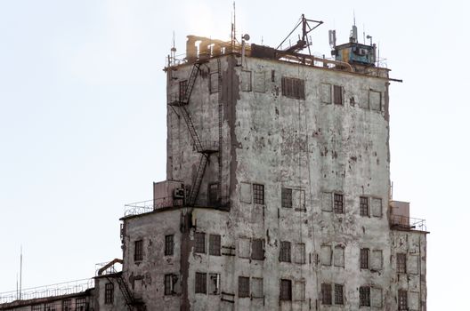 tall old prison building in Ukraine isolated not a light background