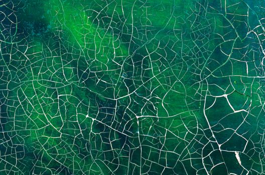 cracked paint on old picture close up abstract background art restoration pattern