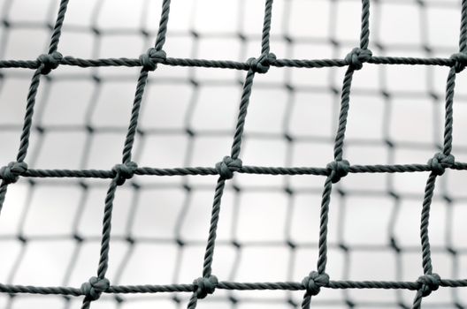 knot rope mesh closeup abstract black and white isolated background pattern close up