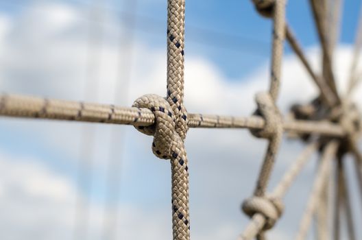 many ropes and one big knot black and white abstract background close up