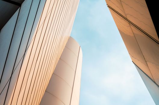 wall of a modern building on a background of blue sky abstract architectural background