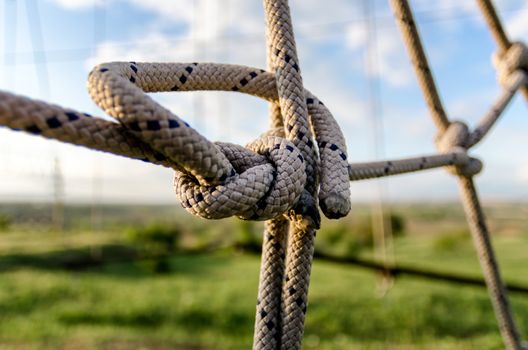 many ropes and one big knot close up