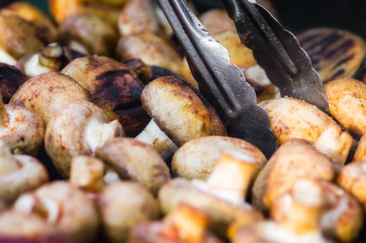 grilled champignon mushrooms closeup