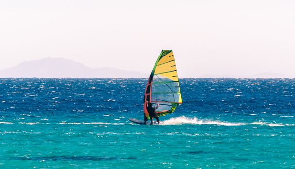 surfer rides in the Red Sea in Egypt