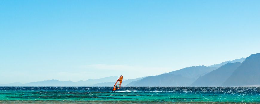 surfer rides in the Red Sea in Egypt