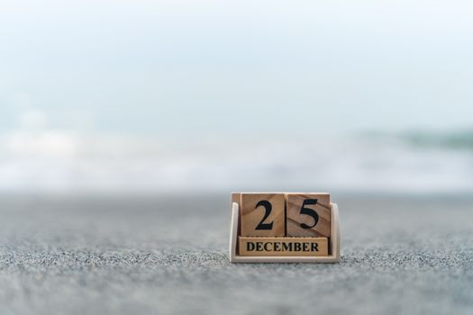 Wood brick block show date and month calendar of 25th December or Chritstmas day. Celebration and holiday long weekend season concept.