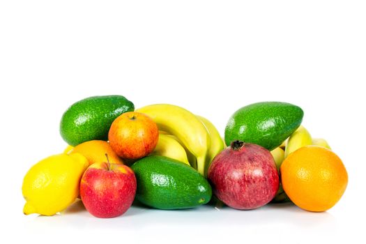 Healthy eating concept - group of various fruits isolated on a white background in close-up