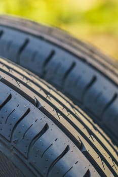 car tire, tread design with selective focus, close-up