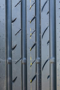 car tire, tread design with selective focus, close-up