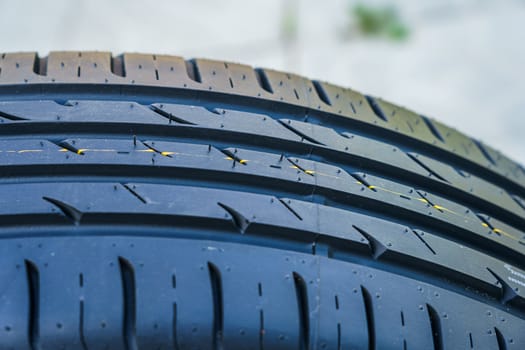 car tire, tread design with selective focus, close-up