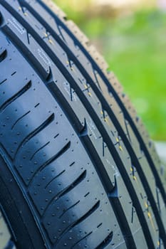 car tire, tread design with selective focus, close-up