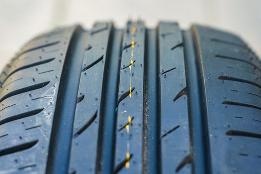 car tire, tread design with selective focus, close-up