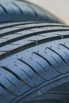 car tire, tread design with selective focus, close-up