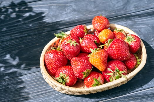 Strawberries in a wicker basket during spring in Poland