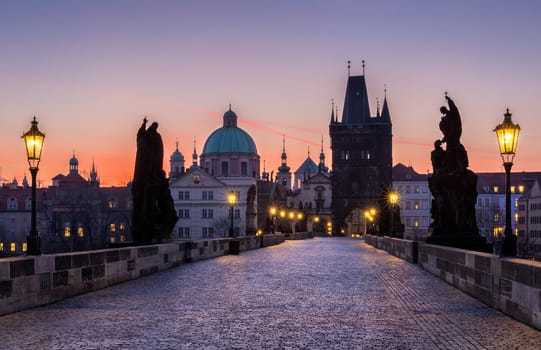 Charles Bridge (Karluv Most) and Old Town Tower, the most beautiful bridge in Czechia. Prague, Czech Republic. 