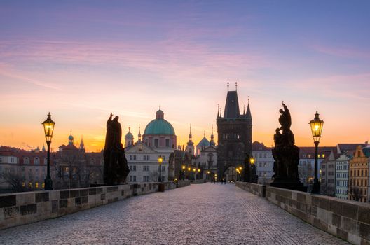 Charles Bridge (Karluv Most) and Old Town Tower, the most beautiful bridge in Czechia. Prague, Czech Republic. 