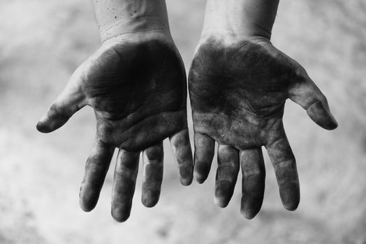 Dirty hands worker hands man / Open hands stained , black and white picture
