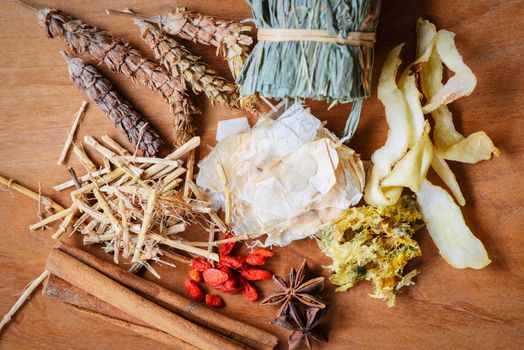 Herbal medicine dried herb from nature Non-toxic organic product on wooden background / Dry spices and herbs dood ingredients in Thailand Asian for healthy lifestyle