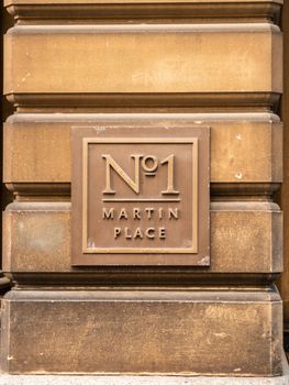 Sydney, Australia - February 12, 2019: Historic and Iconic General Post Office building facade on corner of Martin Place and George Street. Building identification sign.