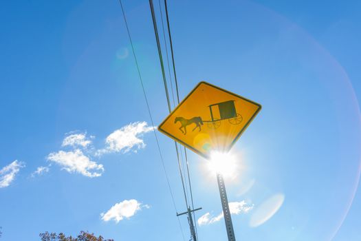 Amish traditional horse and buggy road sign in Lancaster County Pennsylvania, USA.