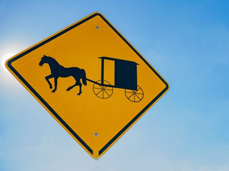 Amish traditional horse and buggy road sign in Lancaster County Pennsylvania, USA.