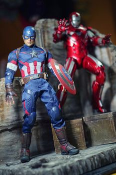 Khonkaen,Thailand - Jan 17th 2016: Caption America and Irons MARK XXXIII man figure 1/6 standing gracefully. Caption America and Iron Man is a popular line of construction toys manufactured