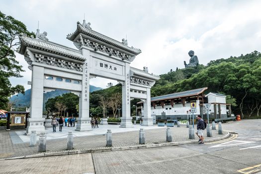 HONG KONG - JANUARY 13, 2016: Tian Tan Buddha aka the Big Buddha is a large bronze statue of a Sakyamuni Buddha and located at Ngong Ping Lantau Island in Hong Kong.