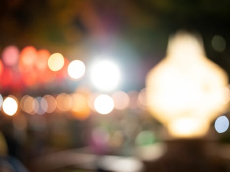 Abstract bokeh background of light from Thai lanna lantern at night.  Concepts of celebration in Yi Peng Festival.