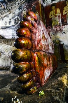 Buddha parinirvana foot Buddhapada statues in Dambulla Cave Temple, Sri Lanka. Cave I (Devaraja Viharaya) Temple of the Lord of the Gods