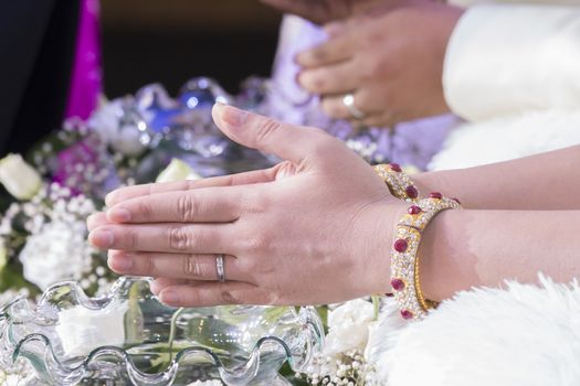 Hand of the bride in thai wedding.