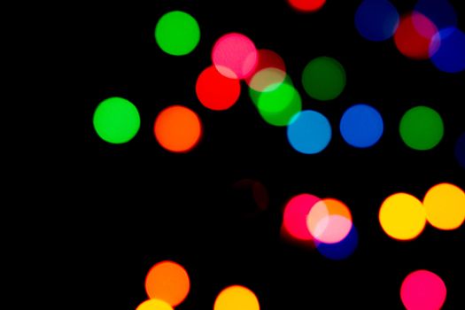 Lights bokeh sparkle background presents for holiday celebration. Copy space.