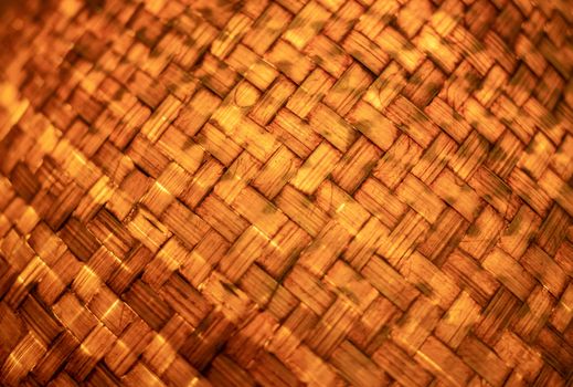 Close up texture of handmade lamp made of wood woven from bamboo sheet.