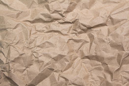 Close up of brown crumpled paper texture background.