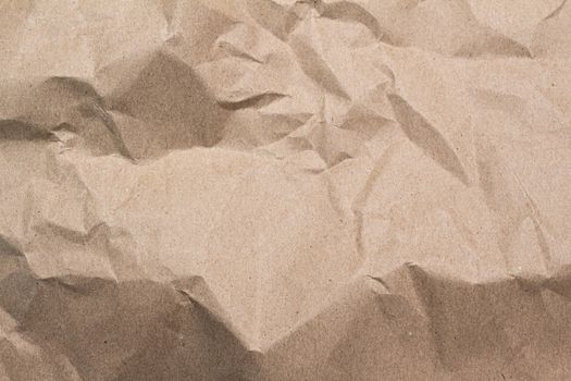 Close up of brown crumpled paper texture background.