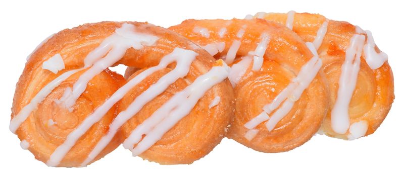 Pretzel shaped sugar cookies, made of puff pastry with butter on a white background. 