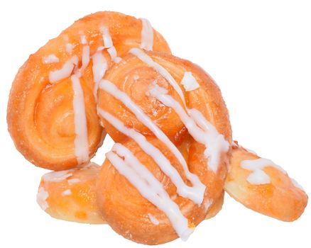 Pretzel shaped sugar cookies, made of puff pastry with butter on a white background. 