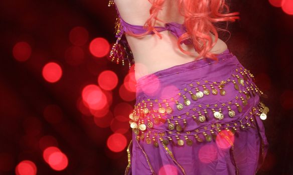Motion Blur Belly Dancer Close-up Purple and Gold