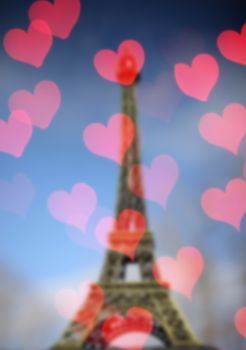 Eiffel Tower Blur Background with Bokeh Hearts