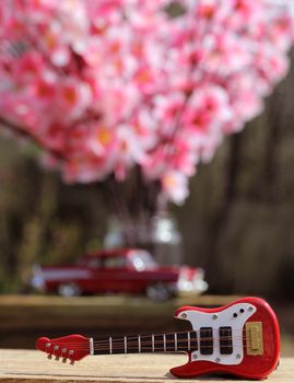 Guitar with Vintage Car and Cherry Blossoms, Shallow DOF