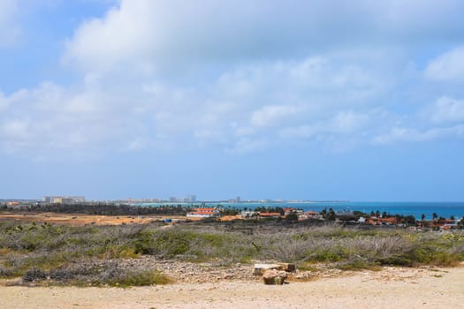 Arikok Natural Park on the island of Aruba in the Caribbean Sea with deserts and ocean waves on the rocky coast