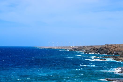 Arikok Natural Park on the island of Aruba in the Caribbean Sea with deserts and ocean waves on the rocky coast