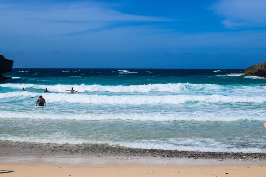 Arikok Natural Park on the island of Aruba in the Caribbean Sea with deserts and ocean waves on the rocky coast