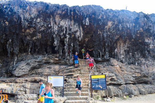 Arikok Natural Park on the island of Aruba in the Caribbean Sea with deserts and ocean waves on the rocky coast