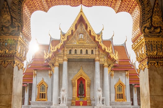 The Marble Temple or Wat Benchamabophit Dusit Wanaram in morning time with sun beam on top of church, famous landmark place for tourist sight seeing in Bangkok Thailand