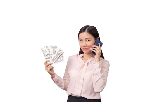 Asian beautiful woman holding banknote money in hand and mobile phone in another hand isolated on white background with clipping path.  commercial business by phone concept