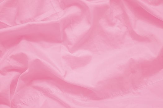 abstract wrinkled sweet pink color fabric cloth texture with fabric seam from yarn for background