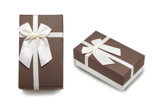 Gift box with white ribbon bow, isolated on white